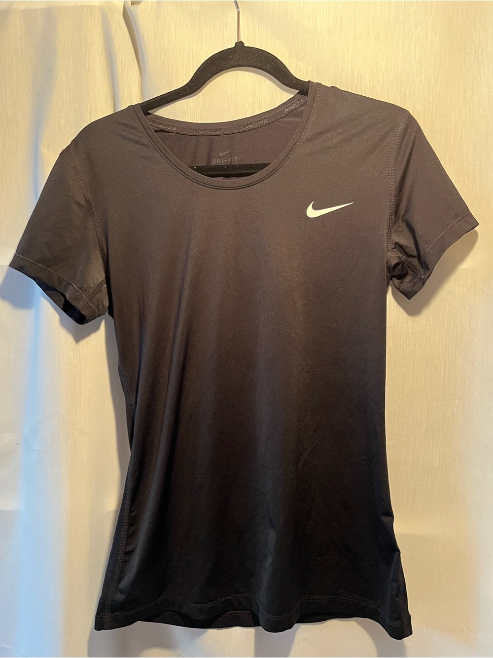 Nike Black Women’s Short Sleeve Dri-FIT Tee with White Swoosh